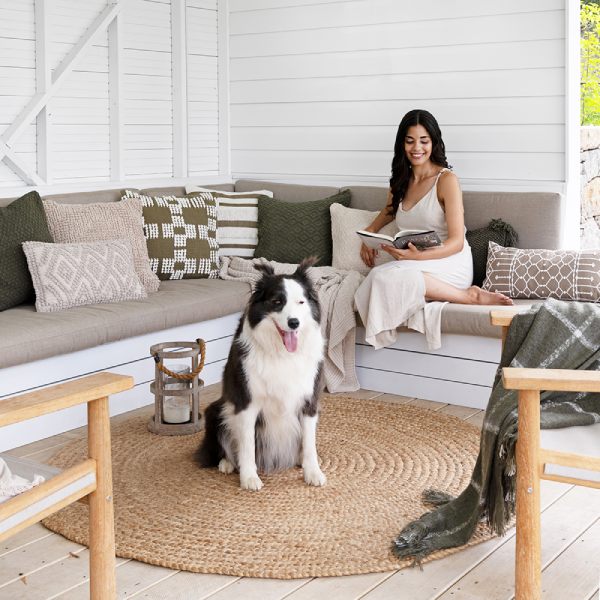 earth tone cushions adorn the rear porch seats